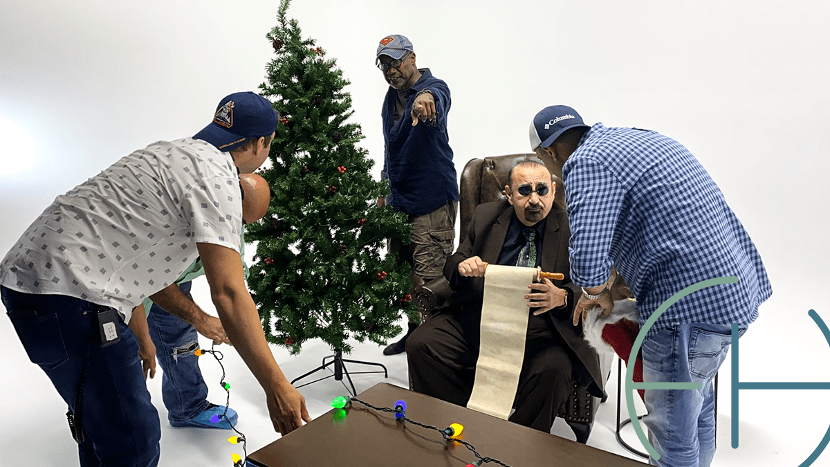 Ken Davitian and production crew on set