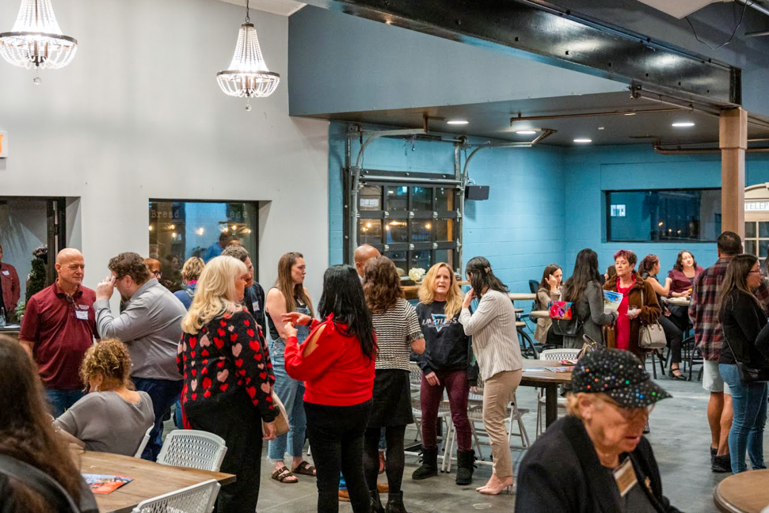 group of people gathered for an event at The Film Hub