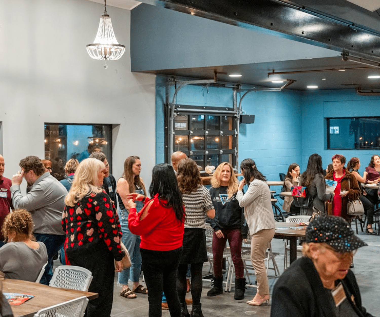 group of people gathered for an event at The Film Hub