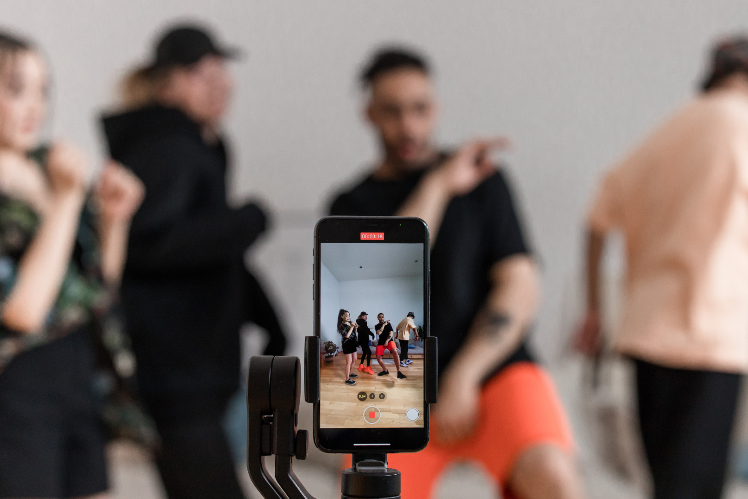 Group of friends recording a TikTok dance