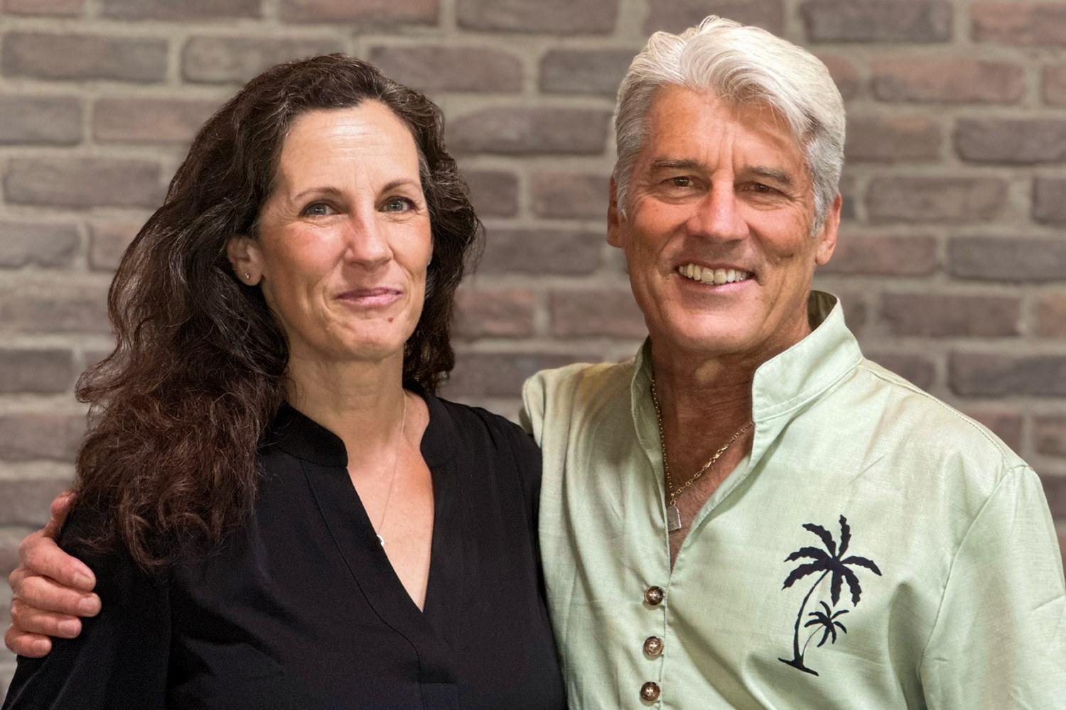 Karin Fittante and Jim Ellis posing for a photo for te Industry of Insights podcast