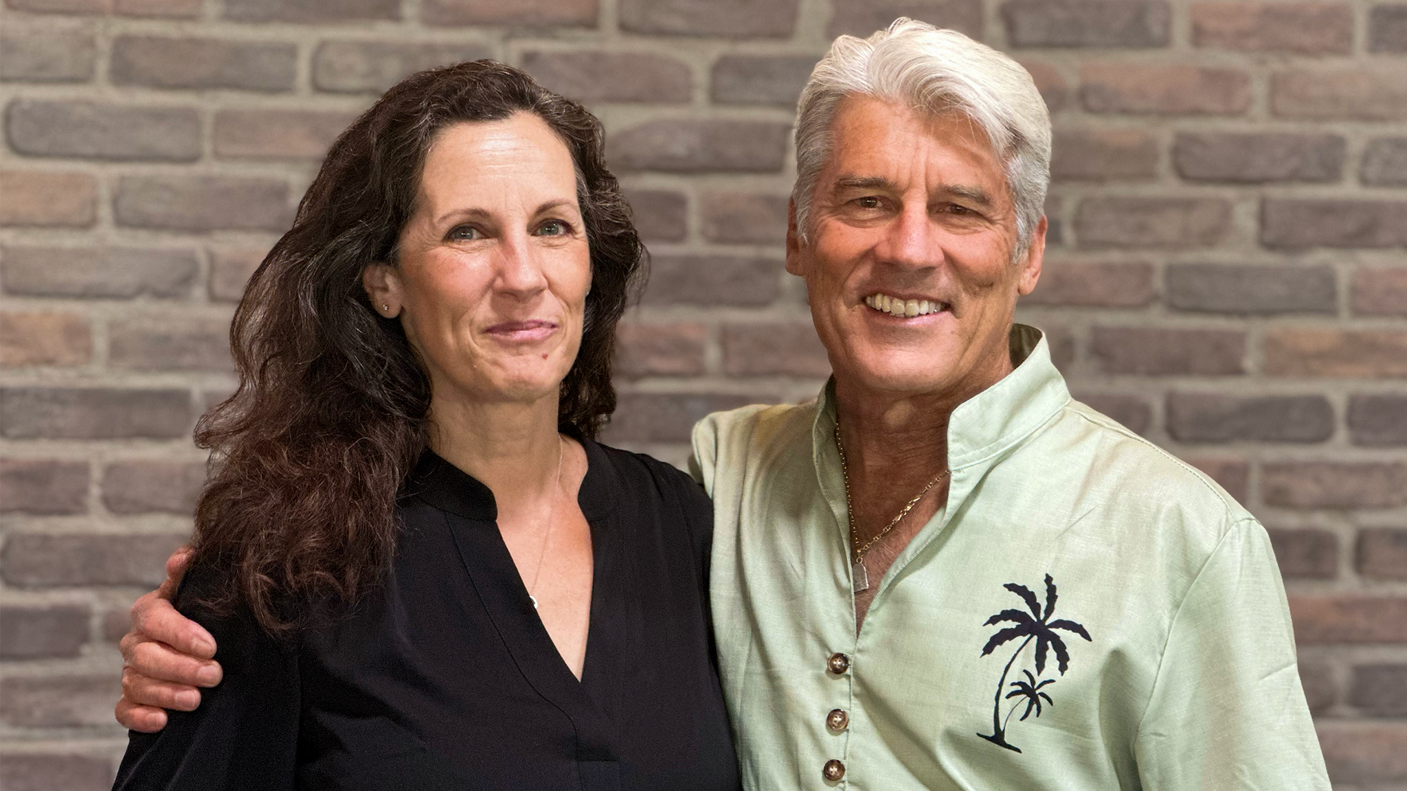 Karin Fittante and Jim Ellis posing for a photo for te Industry of Insights podcast