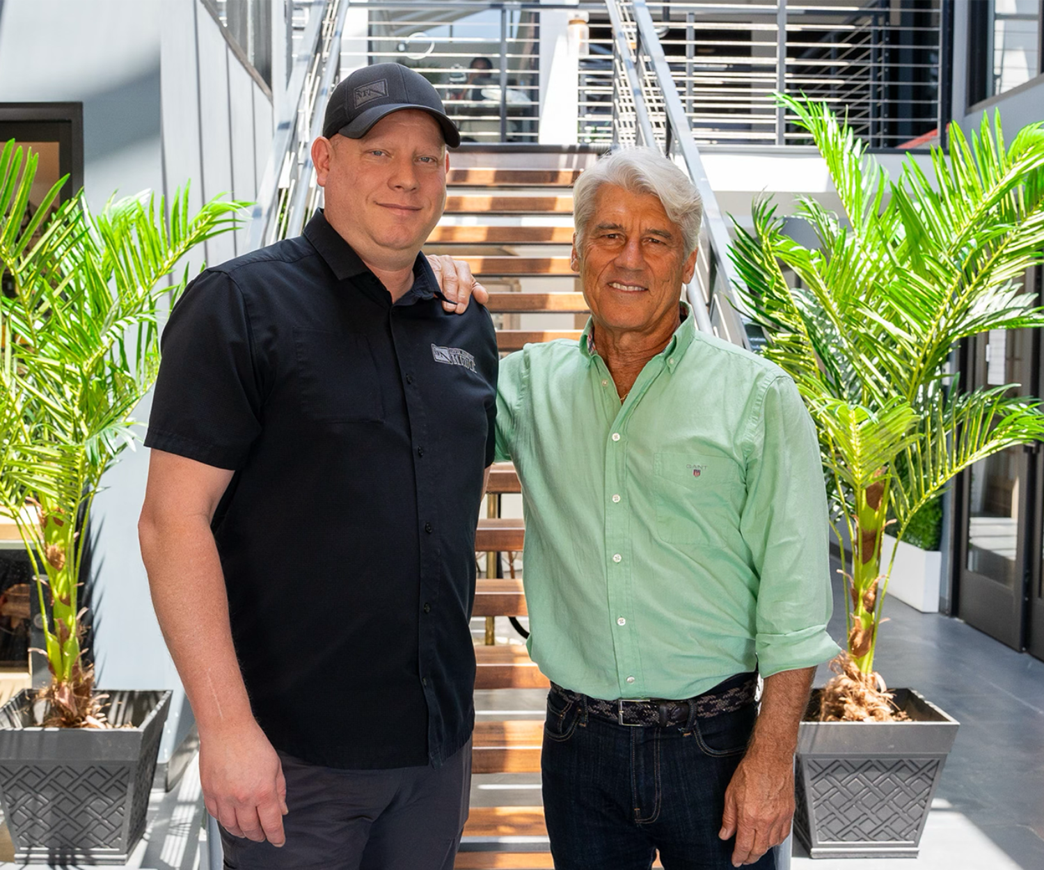 Michael Wood from Never Forgotten Media and Jim Ellis taking a photo after the Industry Insights Podcast