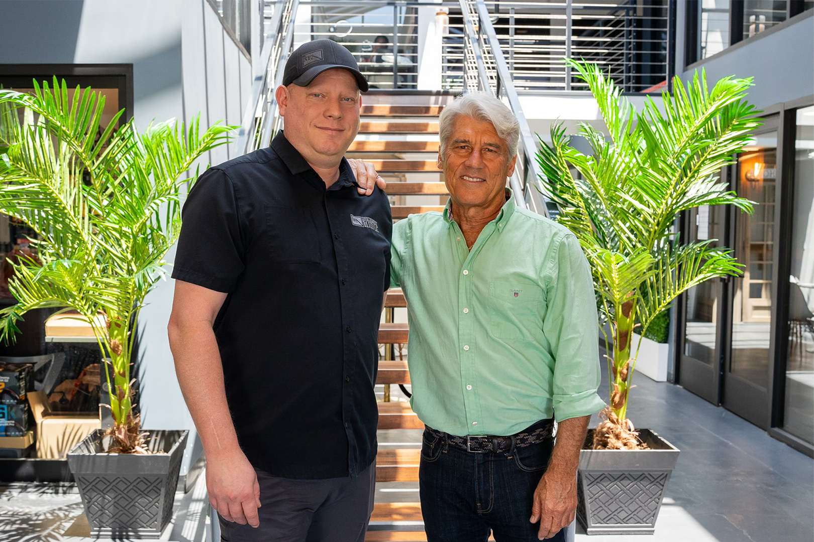 Michael Wood from Never Forgotten Media and Jim Ellis taking a photo after the Industry Insights Podcast