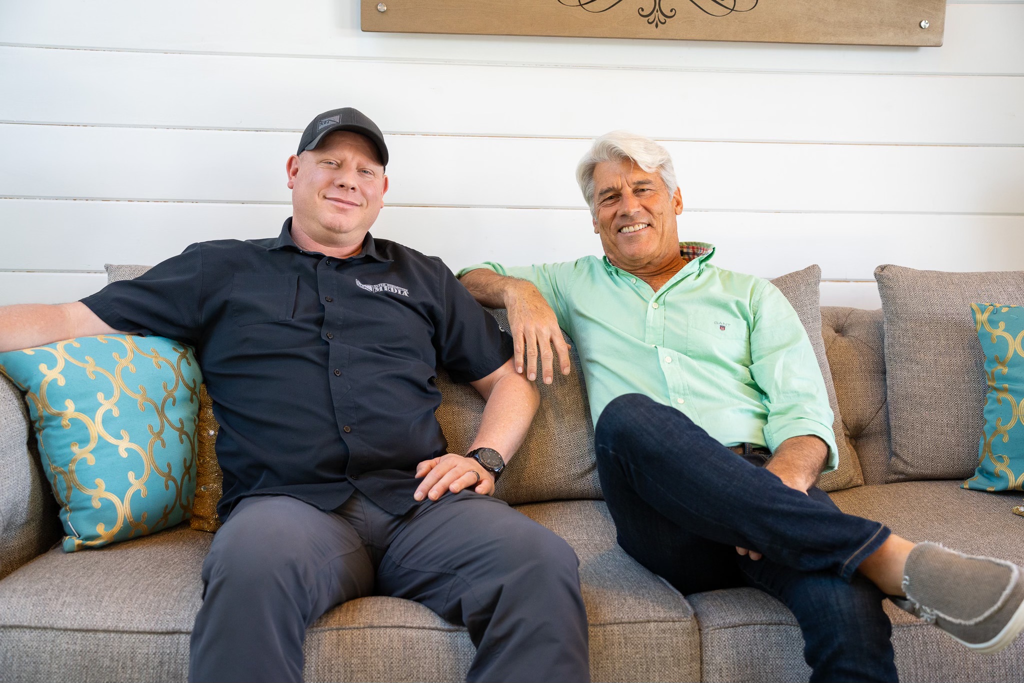 Michael Wood and Jim Ellis sitting together in The Film Hub lobby